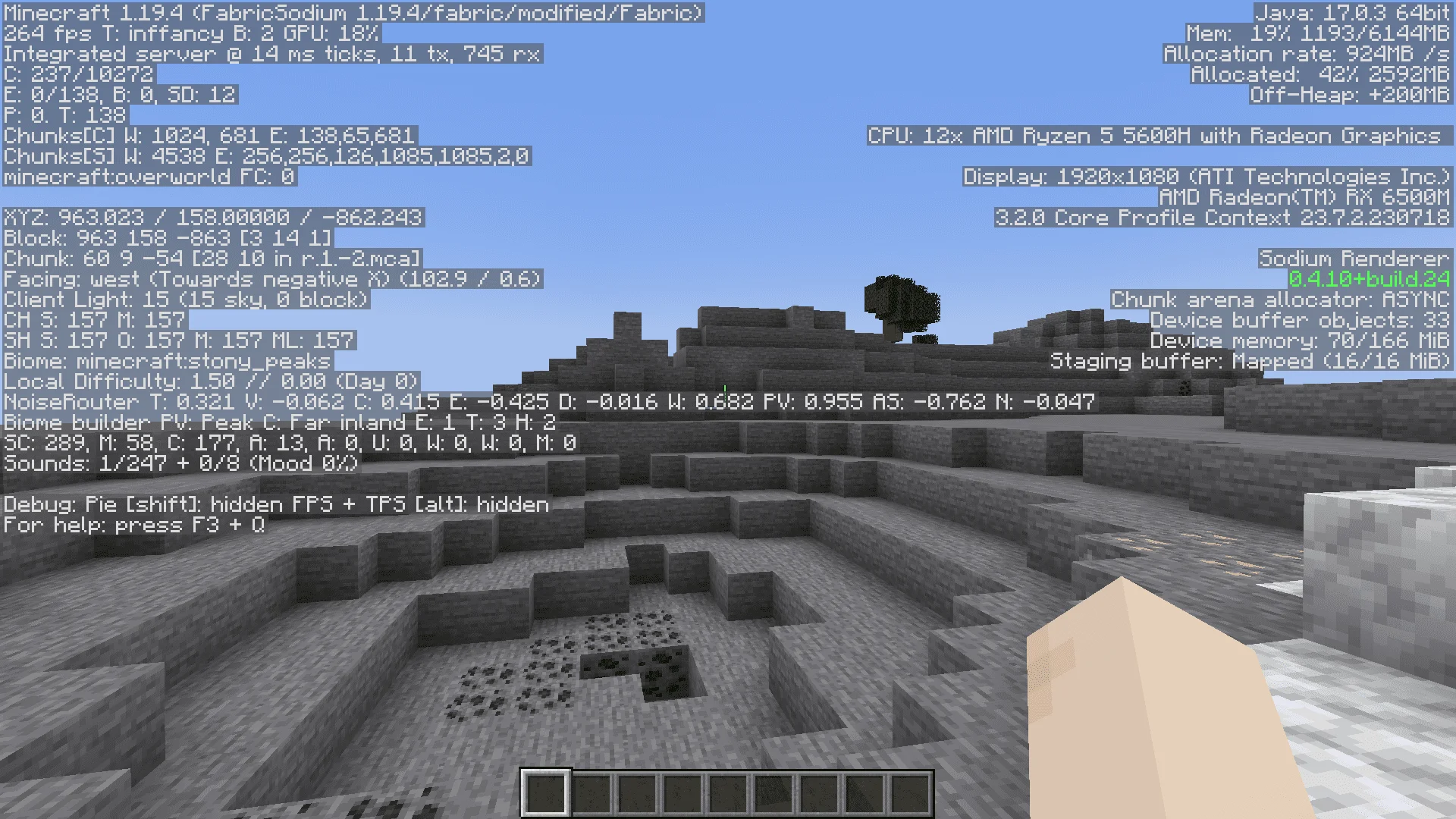 F3 debug screen showing 264 fps and memory stats over a stony peaks crater