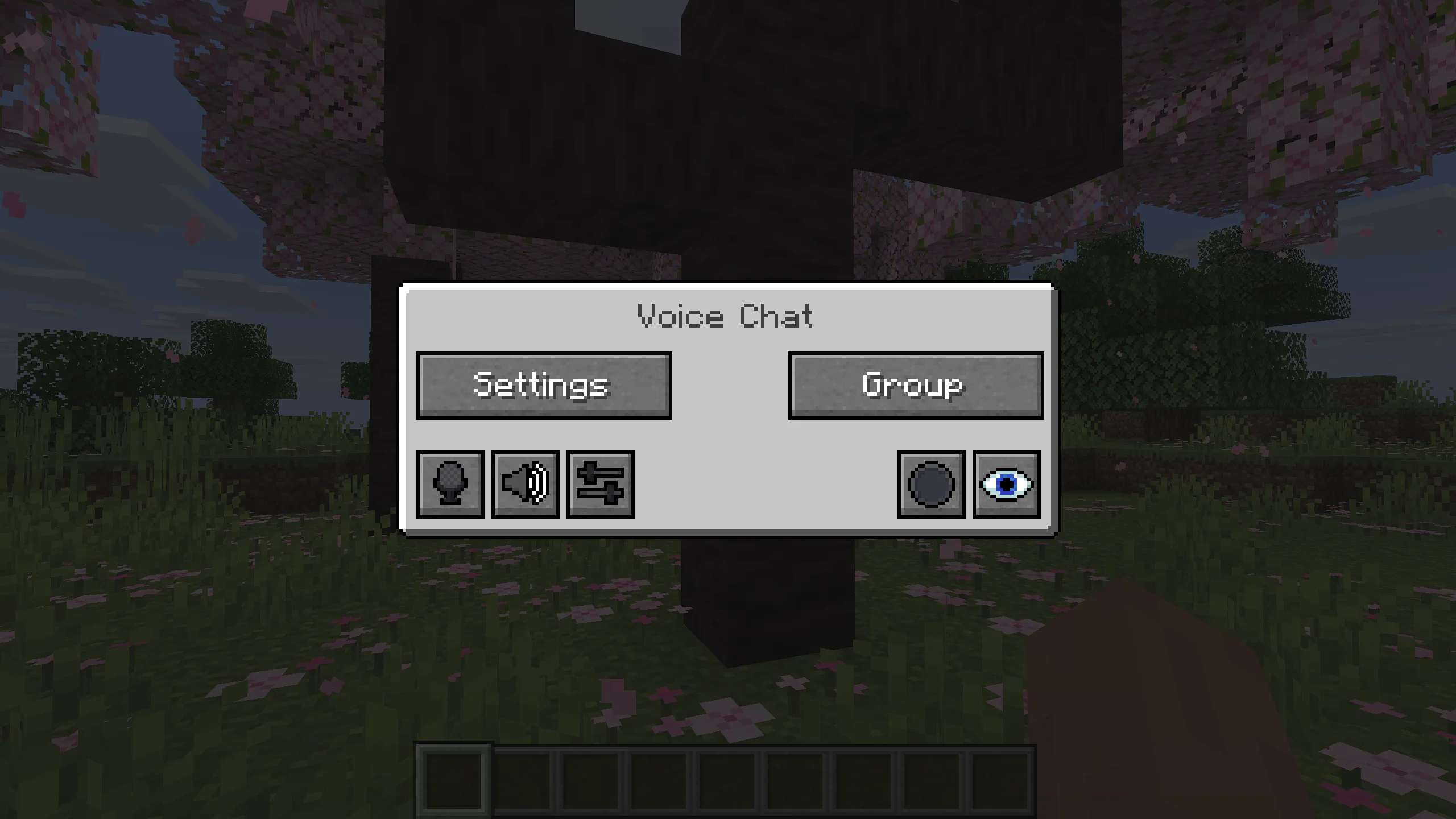 Voice Chat menu with Settings and Group buttons over a cherry grove scene